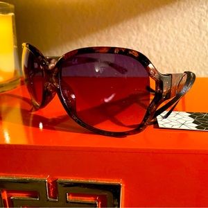 Translucent Tortoiseshell frames. Amethyst lenses.